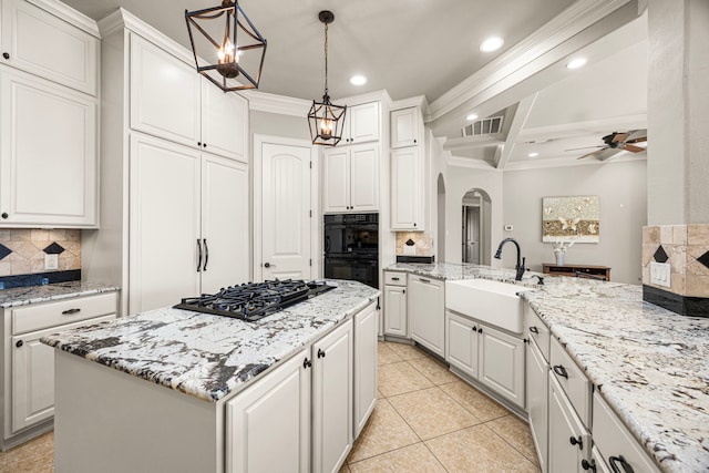 kitchen with arched walkways, stainless steel gas cooktop, ornamental molding, a sink, and dishwasher