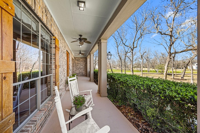 view of patio / terrace featuring ceiling fan and covered porch