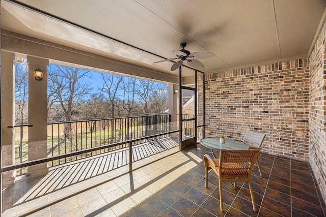 view of patio / terrace featuring a balcony and ceiling fan