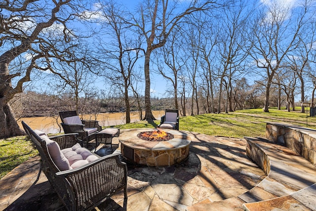 view of patio / terrace featuring a fire pit