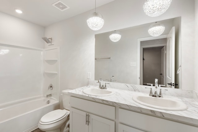 bathroom with a chandelier, bathtub / shower combination, a sink, and visible vents