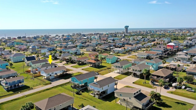 aerial view with a water view and a residential view