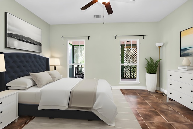 bedroom featuring visible vents, ceiling fan, and baseboards