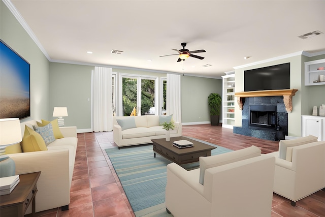 living room featuring visible vents, crown molding, baseboards, and a premium fireplace