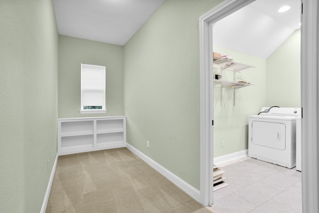 laundry room with washer / dryer, laundry area, and baseboards