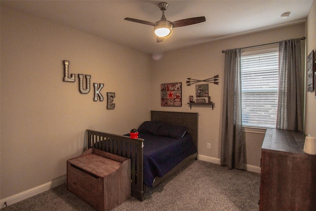 bedroom featuring a ceiling fan, carpet, and baseboards