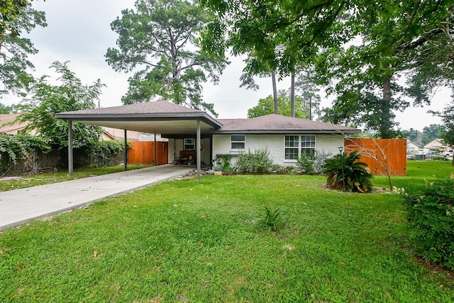 2626 Druid St, Houston, TX 77091 - single story home with a carport, concrete driveway, and brick siding
