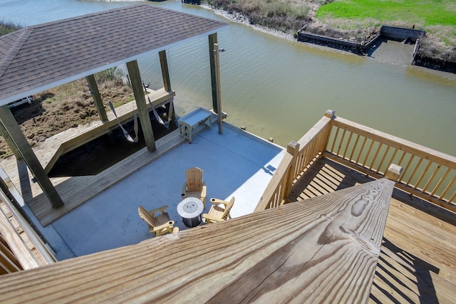 dock area with a water view