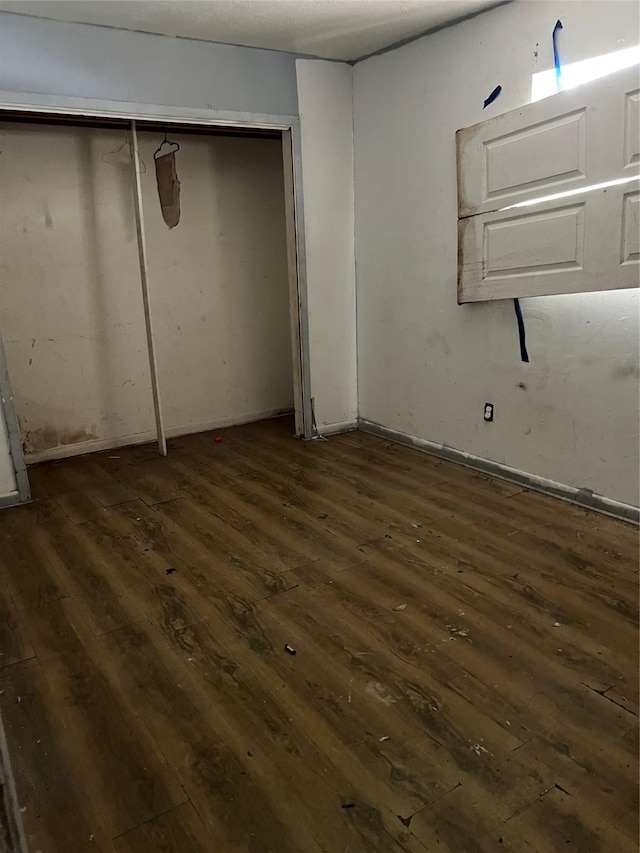 basement with dark wood-style floors