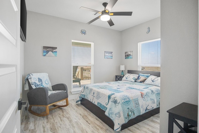 12971/2 Mabry St, Gilchrist, TX 77617 - bedroom featuring ceiling fan and light wood-style flooring