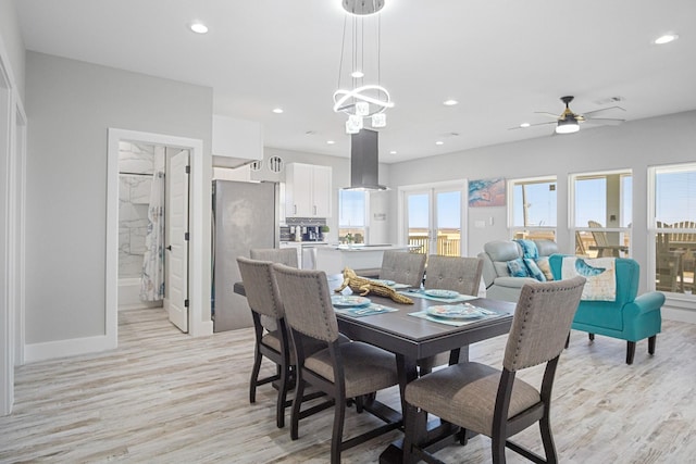 12971/2 Mabry St, Gilchrist, TX 77617 - dining room featuring baseboards, recessed lighting, and light wood-style floors