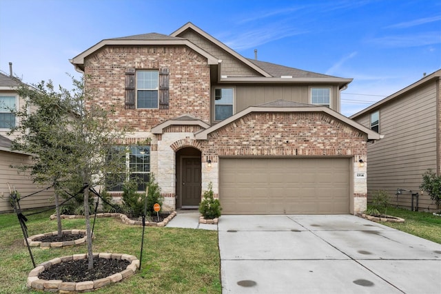 view of front of property featuring an attached garage, brick siding, a shingled roof, driveway, and a front yard