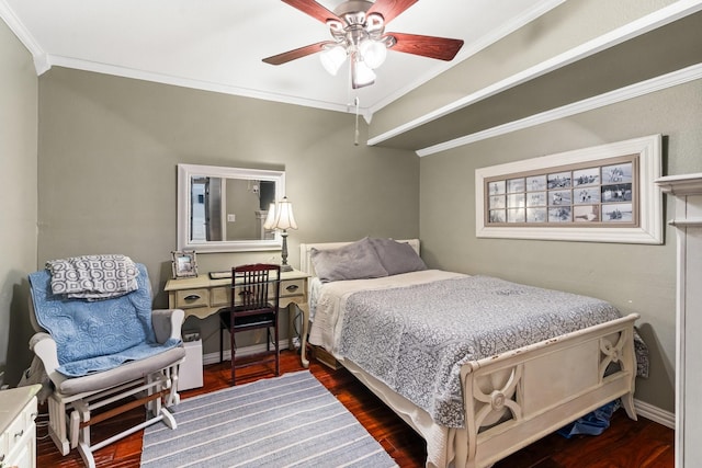 bedroom featuring dark wood-style floors, ceiling fan, baseboards, and crown molding