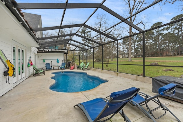 pool with french doors, a yard, grilling area, a patio area, and glass enclosure