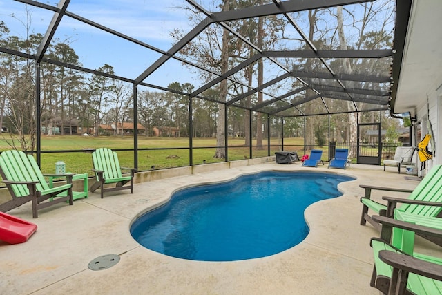 outdoor pool featuring a lanai, a yard, fence, and a patio