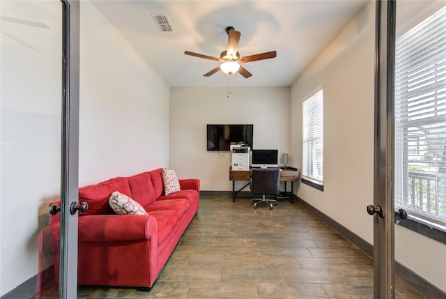 office area featuring dark wood-style floors, french doors, visible vents, a ceiling fan, and baseboards