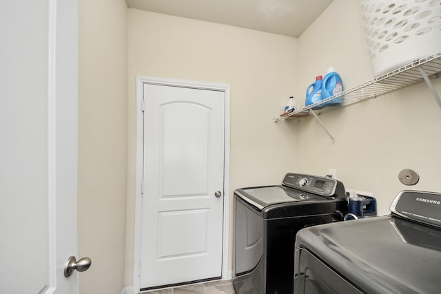 laundry room with laundry area and separate washer and dryer