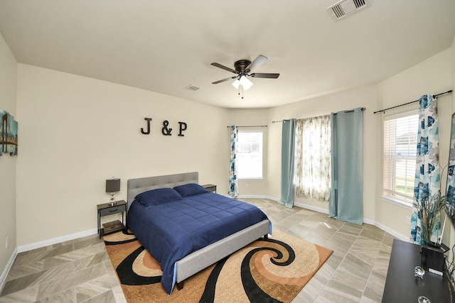 bedroom featuring visible vents, ceiling fan, and baseboards