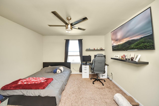 bedroom with light carpet, baseboards, and a ceiling fan