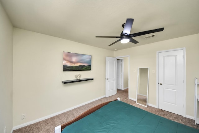 unfurnished bedroom featuring carpet, visible vents, and baseboards