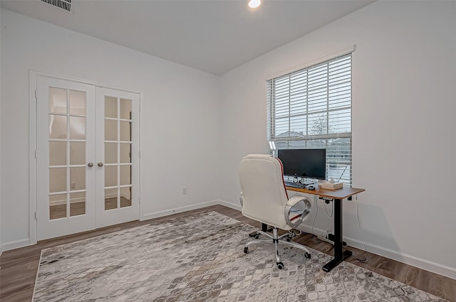 office area featuring french doors, wood finished floors, and baseboards