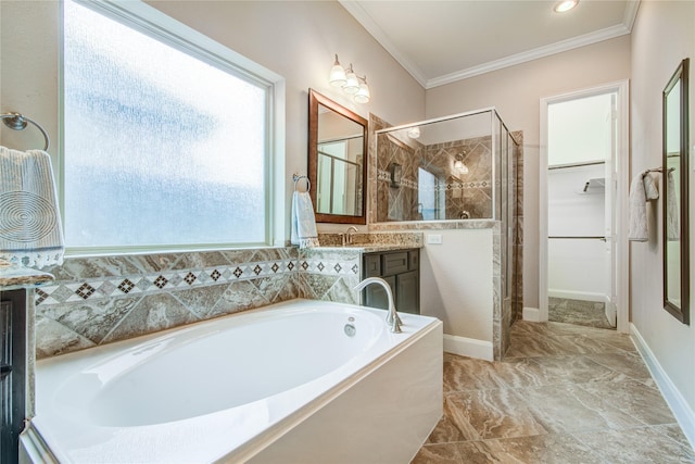 bathroom featuring a garden tub, vanity, a spacious closet, ornamental molding, and a stall shower