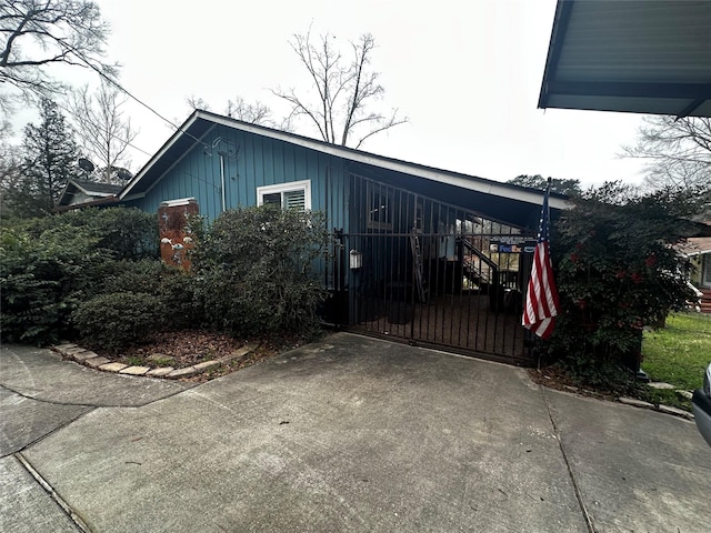 view of property exterior featuring a gate