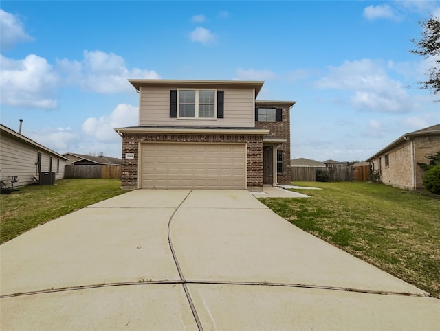 traditional-style house featuring a front yard, concrete driveway, brick siding, and fence