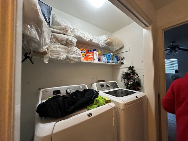 washroom featuring laundry area, washer and clothes dryer, and a ceiling fan