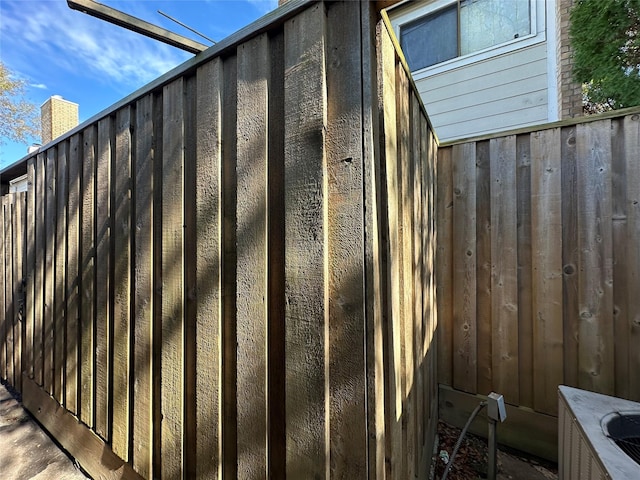 exterior details with fence and board and batten siding