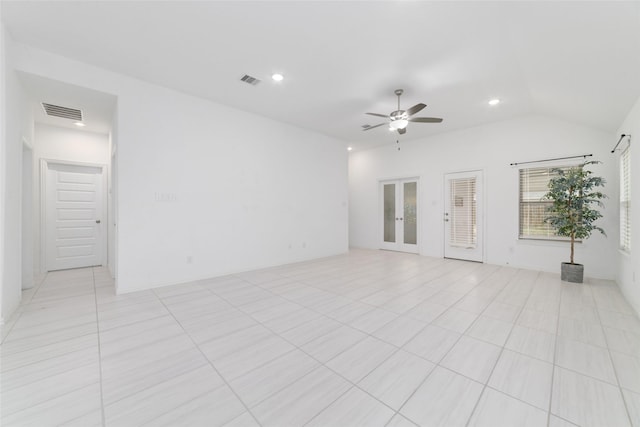 unfurnished room with recessed lighting, visible vents, vaulted ceiling, and french doors