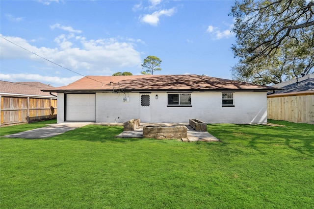 rear view of property featuring brick siding, a lawn, and fence