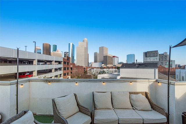 balcony featuring a view of city