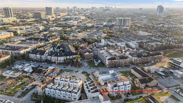 birds eye view of property featuring a view of city