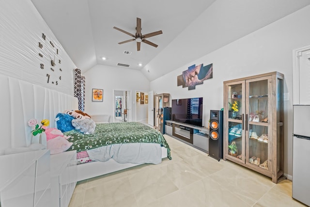 bedroom with lofted ceiling, visible vents, freestanding refrigerator, and recessed lighting