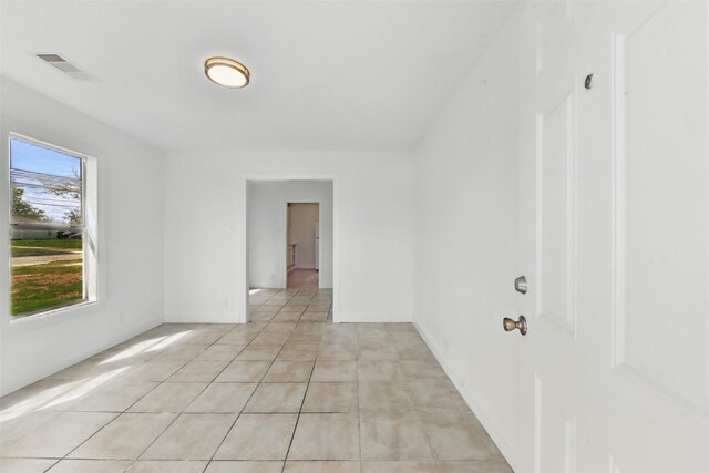 2430 5th Ave N, Texas City, TX 77590 - empty room featuring light tile patterned floors and visible vents