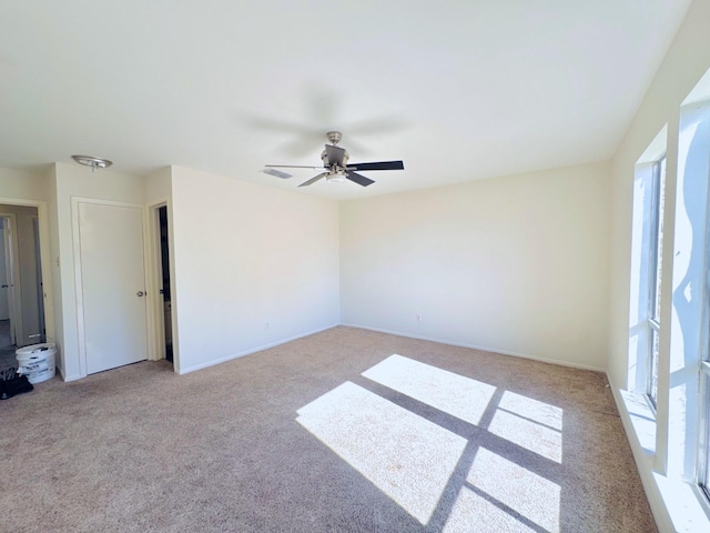 7932 Grow Ln, Houston, TX 77040 - carpeted spare room with visible vents, a ceiling fan, and baseboards