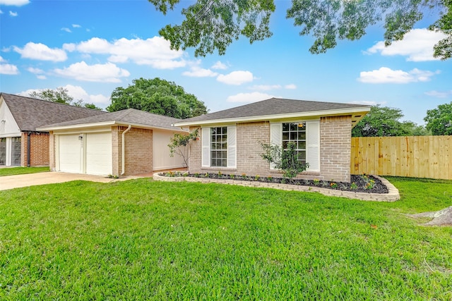 ranch-style home with an attached garage, a front lawn, fence, and brick siding
