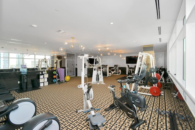 gym featuring recessed lighting