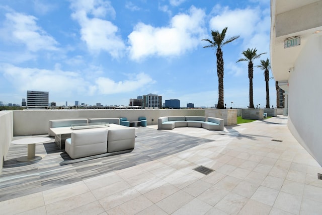 view of patio / terrace featuring a city view