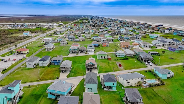 bird's eye view with a water view and a residential view