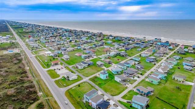 bird's eye view featuring a water view and a residential view