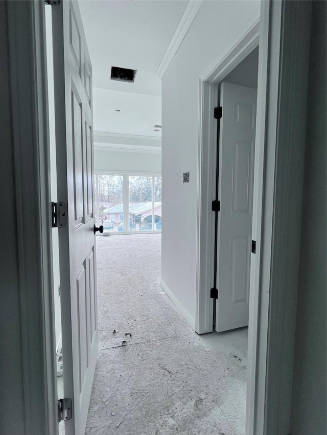 corridor with crown molding