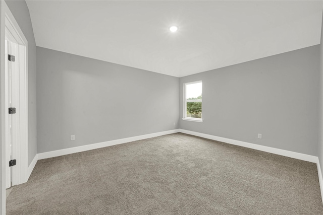 unfurnished room with recessed lighting, carpet flooring, and baseboards