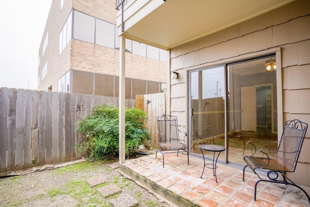 view of patio featuring fence