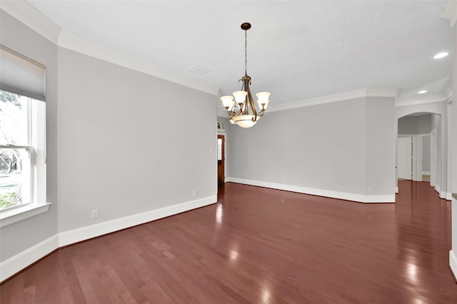 unfurnished room with an inviting chandelier, baseboards, and ornamental molding