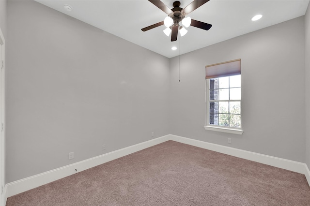 carpeted empty room featuring ceiling fan, recessed lighting, and baseboards