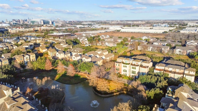 birds eye view of property featuring a residential view and a water view