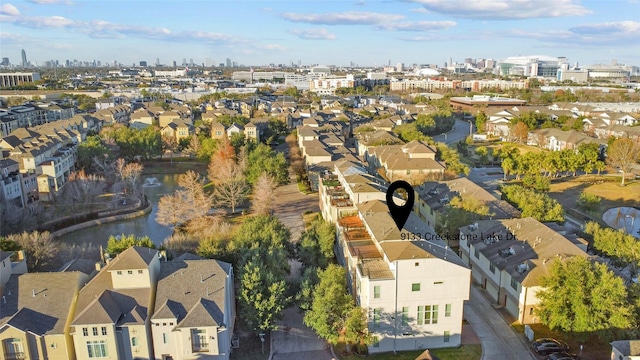 birds eye view of property with a view of city and a residential view