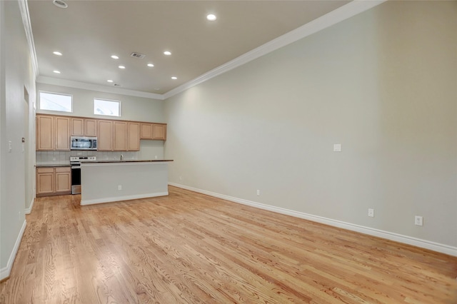 kitchen featuring electric range, visible vents, open floor plan, backsplash, and stainless steel microwave